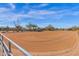 Outdoor riding arena featuring well-maintained sand, sturdy fencing, and ample space for equestrian activities at 5914 E Dale Ln, Cave Creek, AZ 85331