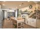 Charming kitchen featuring a butcher block island, stainless steel appliances, and ample counter space at 6014 W Bent Tree Dr, Phoenix, AZ 85083