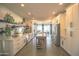 Bright kitchen with modern appliances, white cabinetry, and a spacious center island at 6014 W Bent Tree Dr, Phoenix, AZ 85083