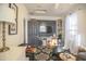 Cozy living room with a media center, comfortable seating, and bright windows, perfect for relaxation and entertainment at 6014 W Bent Tree Dr, Phoenix, AZ 85083