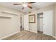 Bedroom featuring modern laminate flooring and a closet at 635 W Douglas Ave, Gilbert, AZ 85233