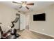 Third bedroom featuring laminate flooring, neutral tones, and a closet at 635 W Douglas Ave, Gilbert, AZ 85233