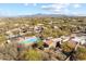 Aerial view of a desert home with a pool and mountain views at 9221 E Whitethorn Cir, Scottsdale, AZ 85266