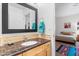 Stylish bathroom featuring granite countertop, modern fixtures, and neutral color scheme at 9221 E Whitethorn Cir, Scottsdale, AZ 85266