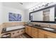 Large bathroom with a soaking tub, granite countertops, and a decorative backsplash at 9221 E Whitethorn Cir, Scottsdale, AZ 85266