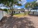 Backyard view featuring desert landscaping and a grass lawn at 10030 W Illini St, Tolleson, AZ 85353