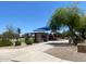 Community park with covered picnic pavilion and playground at 10030 W Illini St, Tolleson, AZ 85353