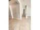 Neutral living room space with tile flooring and modern wall details at 10030 W Illini St, Tolleson, AZ 85353