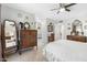 Charming bedroom featuring antique dressers and a ceiling fan for added comfort at 1047 E 9Th St, Mesa, AZ 85203