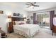 Cozy bedroom with a sliding glass door to patio, and ample natural light at 1047 E 9Th St, Mesa, AZ 85203