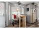 Dining area with table, pendant lighting, and built-in cabinets providing ample storage at 111 S Greenfield Rd # 97, Mesa, AZ 85206