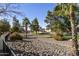 Community walking path with lush greenery and manicured landscaping creating a tranquil outdoor oasis at 11115 E Bellflower Ct, Sun Lakes, AZ 85248