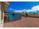 View of the backyard, showcasing the storage shed with desert landscaping at 1117 W Mesquite St, Chandler, AZ 85224