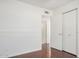 Light-filled bedroom featuring hardwood floors and a closet at 1117 W Mesquite St, Chandler, AZ 85224