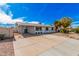 Single-story home featuring a covered carport and low-maintenance desert landscaping at 1117 W Mesquite St, Chandler, AZ 85224