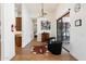 Bright hallway with view of the pool from a large sliding glass door with access to the kitchen and the bedroom at 11222 N 73Rd St, Scottsdale, AZ 85260