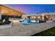 Beautiful backyard pool and spa featuring a modern patio, cacti and other desert landscaping at 11222 N 73Rd St, Scottsdale, AZ 85260