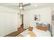 Bright bedroom featuring neutral decor, closet, and a ceiling fan at 15035 N 54Th St, Scottsdale, AZ 85254