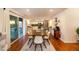 Open dining area with a view of the kitchen and sliding doors leading to the patio for easy outdoor access at 15035 N 54Th St, Scottsdale, AZ 85254