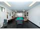 This game room offers a pool table, foosball table, and seating area for entertainment at 15035 N 54Th St, Scottsdale, AZ 85254