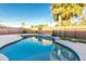 Inviting backyard pool area, showcasing the pool and mature landscaping for a serene and relaxing atmosphere at 15035 N 54Th St, Scottsdale, AZ 85254