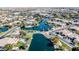 Stunning aerial view of a residential neighborhood, with beautiful lake views and lush green landscaping at 1738 W Yosemite Pl, Chandler, AZ 85248