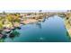 Wide angle aerial of a lovely community with lake access, mature landscaping, and beautiful Arizona homes at 1738 W Yosemite Pl, Chandler, AZ 85248