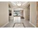 Inviting foyer leading into a spacious living room with arched doorways and tile flooring at 1738 W Yosemite Pl, Chandler, AZ 85248