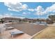 Community park featuring cornhole boards, picnic tables, and seating areas for residents at 17580 W Country Club Ter, Surprise, AZ 85387