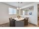 Dining room featuring a round table with seating for four at 17580 W Country Club Ter, Surprise, AZ 85387