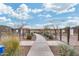 Inviting community dog park features separate areas for large and small dogs, and comfortable seating at 17580 W Country Club Ter, Surprise, AZ 85387