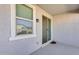 Covered patio with window and sliding door at 17580 W Country Club Ter, Surprise, AZ 85387