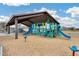 Vibrant community playground with slides and climbing structures for outdoor fun at 17580 W Country Club Ter, Surprise, AZ 85387