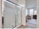 Bathroom showing a shower with glass doors at 17580 W Country Club Ter, Surprise, AZ 85387