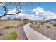 Gravel community walking path surrounded by native desert landscaping at 17580 W Country Club Ter, Surprise, AZ 85387