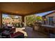 This covered patio features a built-in grill and bar, perfect for outdoor entertaining at 18068 E Curva De Plata --, Rio Verde, AZ 85263