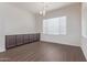 Dining area with a stylish light fixture and a built-in cabinet at 20931 E Via Del Sol St, Queen Creek, AZ 85142