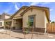 Charming single-story home with a cozy front porch and desert landscaping at 20931 E Via Del Sol St, Queen Creek, AZ 85142