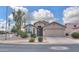 Charming single-story home featuring desert landscaping and a two-car garage at 2477 E Valencia Dr, Casa Grande, AZ 85194