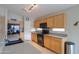 Spacious kitchen featuring stainless steel appliances, ample counter space, and light wood cabinetry at 2477 E Valencia Dr, Casa Grande, AZ 85194