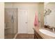 Bathroom includes granite countertop, large shower with glass door, and neutral tones at 24816 N Good Pasture Ln, Florence, AZ 85132