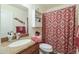 Bathroom featuring a decorative shower curtain and a marble countertop sink at 24816 N Good Pasture Ln, Florence, AZ 85132