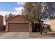 Exterior view features desert landscaping and a two car garage at 24816 N Good Pasture Ln, Florence, AZ 85132