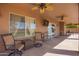 Comfortable covered patio with seating and fan, perfect for relaxation and enjoying the outdoor space at 2535 E Saratoga St, Gilbert, AZ 85296