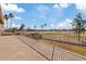 Spacious patio overlooking a lush golf course with blue skies and palm trees at 2535 E Saratoga St, Gilbert, AZ 85296