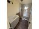 Bathroom featuring a modern tiled shower and a new vanity with a white sink at 2540 E Hartford Ave, Phoenix, AZ 85032