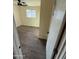 Bedroom with laminate floors, light colored walls and a ceiling fan at 2540 E Hartford Ave, Phoenix, AZ 85032