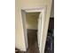 View of a bedroom doorway with updated flooring and fresh paint at 2540 E Hartford Ave, Phoenix, AZ 85032