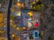 Aerial view of a private backyard with a pool and landscaping at dusk at 27606 N 61St Pl, Scottsdale, AZ 85266