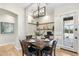 Cozy breakfast nook featuring a rustic table with seating for four and natural light at 27606 N 61St Pl, Scottsdale, AZ 85266